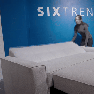 Animation of a click-clack sofa bed's backrest folding down flat into sleeping position